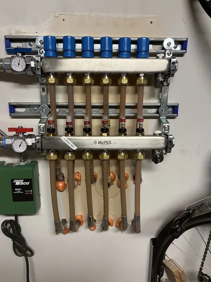 Plumber performing Water Heater Repair at a residential property in Hope